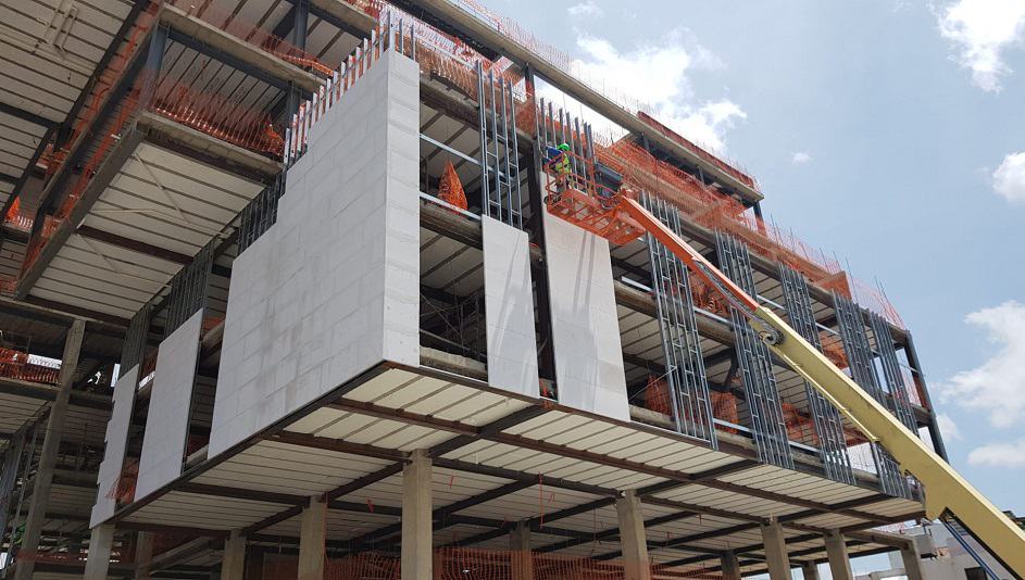 Site Application Of Reinforced Products Floor And Cladding Panels On Steel Structure